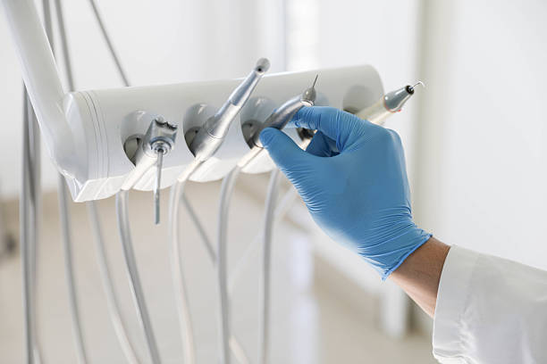 Professional Root Canal Treatment technician working in Clear Lake, WI